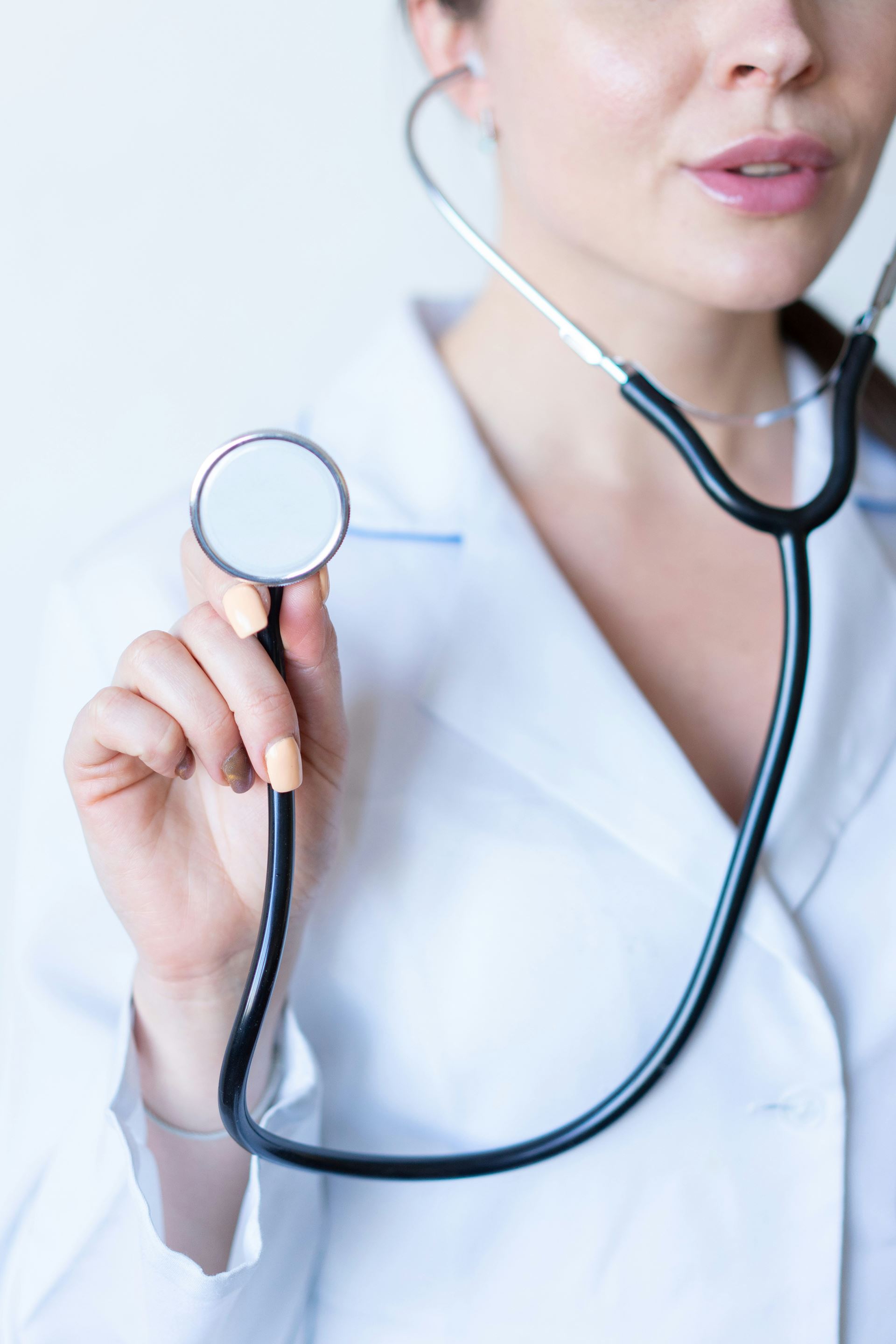 a clinician with a stethoscope